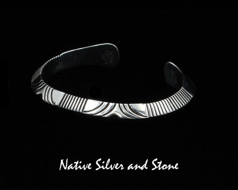 Z Artie Yellowhorse - Navajo<br>D1<br>by Henry Chackee<br>Navajo<br>3/8" Bracelet Cuff<br>Tri-Peaked Sawcuts<br>Flared Ends<br>Sterling Silver<br>Size 6-3/8 (Medium)