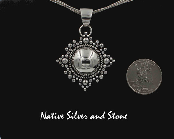 Artie Yellowhorse - Navajo<br>1-5/8" Pendant - Small Version<br>Snowflake/Star Domed<br>Sterling Silver