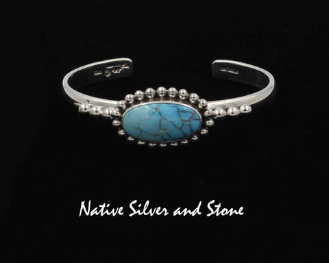 Z Artie Yellowhorse - Navajo<br>BCTSB<br>1/4"  Bracelet Cuff<br>20mm x 10mm Turquoise<br>Horizontal Oval<br>Single Bead<br>w 3 Bead Flanks<br>Sterling Silver<br>Size 6-3/16 (Small-Medium)