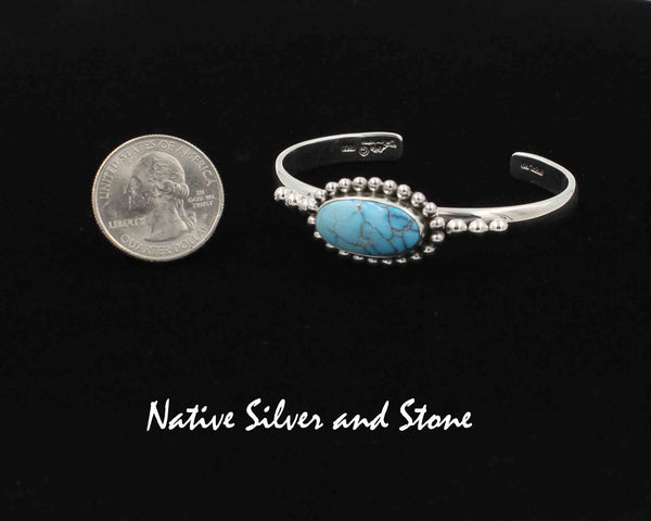 Z Artie Yellowhorse - Navajo<br>BCTSB<br>1/4"  Bracelet Cuff<br>20mm x 10mm Turquoise<br>Horizontal Oval<br>Single Bead<br>w 3 Bead Flanks<br>Sterling Silver<br>Size 6-3/16 (Small-Medium)