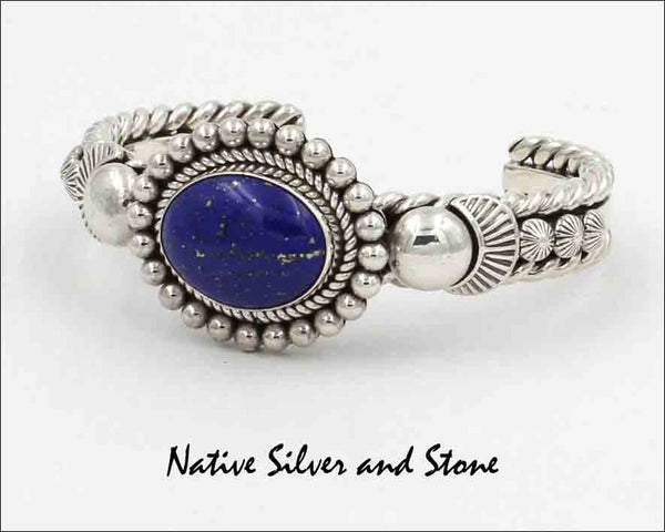 Z Artie Yellowhorse - Navajo<br>BCLTSBST<br>7/16" Bracelet Cuff<br>19mm x 15mm Lapis Lazuli Oval<br>Single Twist & Bead<br>Stamping<br>Sterling Silver<br>Size 6-1/8 (Medium-Small)