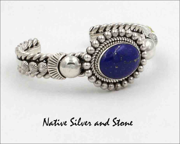 Z Artie Yellowhorse - Navajo<br>BCLTSBST<br>7/16" Bracelet Cuff<br>19mm x 15mm Lapis Lazuli Oval<br>Single Twist & Bead<br>Stamping<br>Sterling Silver<br>Size 6-1/8 (Medium-Small)