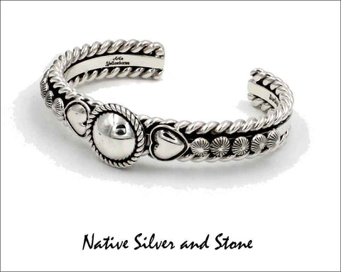 Z Artie Yellowhorse - Navajo<br>7/16" Bracelet Cuff<br>5/8" Dome w Twist<br>Dual Hearts, & Shots<br>Sterling Silver<br>Size 6-1/8 (Small-Medium)