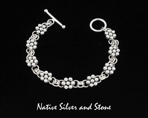 Z Artie Yellowhorse - Navajo<br>Link Bracelet<br>9 Clusters of 7 All-Silver Beads<br>Sterling Silver