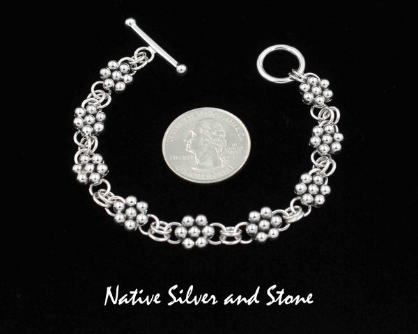 Z Artie Yellowhorse - Navajo<br>Link Bracelet<br>9 Clusters of 7 All-Silver Beads<br>Sterling Silver