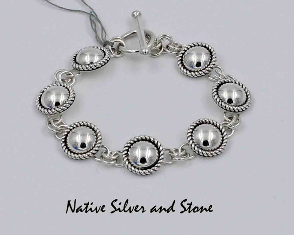 Z Artie Yellowhorse - Navajo Jewelry<br>Link Bracelet<br>Silver Domes<br>with Twist Wire Sterling Silver Perimeter