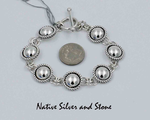 Z Artie Yellowhorse - Navajo Jewelry<br>Link Bracelet<br>Silver Domes<br>with Twist Wire Sterling Silver Perimeter