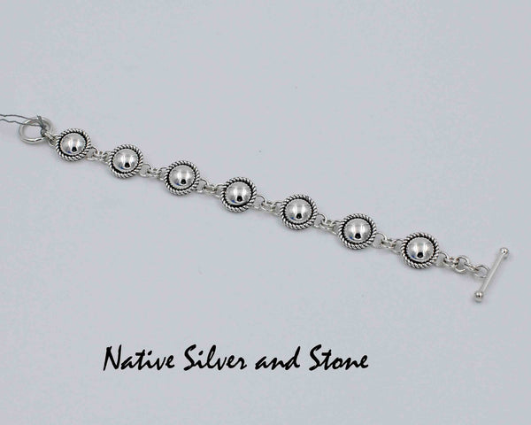 Z Artie Yellowhorse - Navajo Jewelry<br>Link Bracelet<br>Silver Domes<br>with Twist Wire Sterling Silver Perimeter