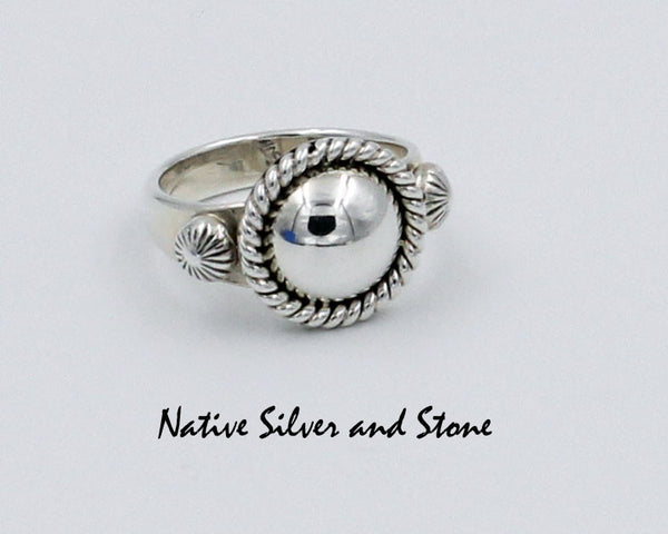 Artie Yellowhorse - Navajo<br>9/16" Ring<br>10mm Small Dome<br>Raised Stamped Shots on Flanks<br>Single Twist<br>Sterling Silver<br>Sizes: 6-1/2, 7-1/4, 7-1/2
