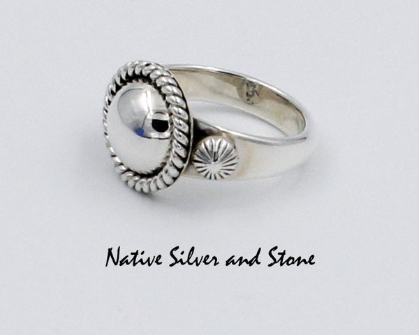 Artie Yellowhorse - Navajo<br>9/16" Ring<br>10mm Small Dome<br>Raised Stamped Shots on Flanks<br>Single Twist<br>Sterling Silver<br>Sizes: 6-1/2, 7-1/4, 7-1/2