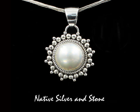 Z Artie Yellowhorse - Navajo<br>1-1/4"  Pendant<br>17mm White Mabe Pearl<br>Single Twist & Burst Bead<br>Sterling Silver