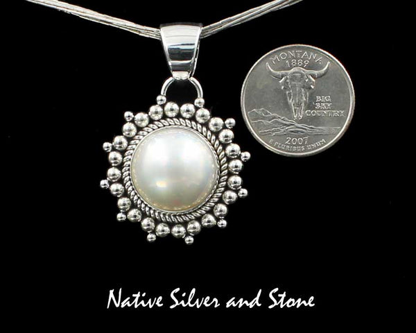 Z Artie Yellowhorse - Navajo<br>1-1/4"  Pendant<br>17mm White Mabe Pearl<br>Single Twist & Burst Bead<br>Sterling Silver
