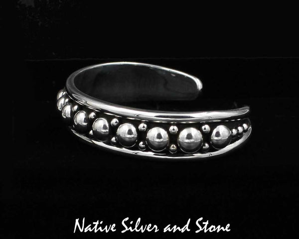Z Artie Yellowhorse - Navajo<br>1/2" Bracelet Cuff<br>Graduated Large & Small Beads/Dots<br>2 Rails - Rounded<br>Sterling Silver<br>Size 6-3/8 (Medium)