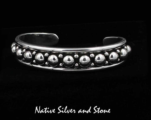 Z Artie Yellowhorse - Navajo<br>1/2" Bracelet Cuff<br>Graduated Large & Small Beads/Dots<br>2 Rails - Rounded<br>Sterling Silver<br>Size 6-3/8 (Medium)