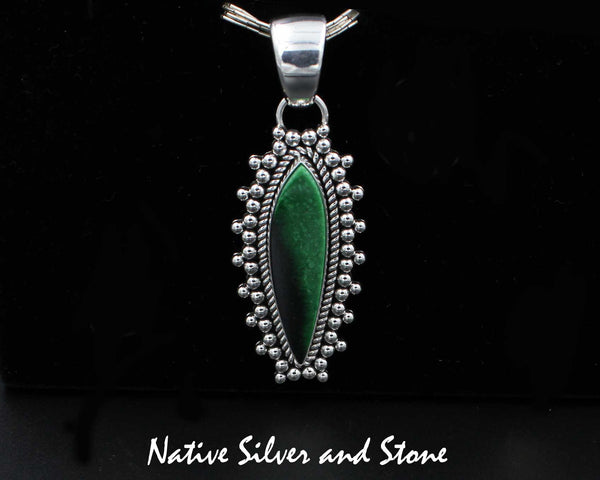 Z Artie Yellowhorse - Navajo<br>1-7/8" Pendant<br>Green Garnet<br>Vertical Sharp Oval<br>Single Twist &<br>Burst Beads/Scatterdot<br>Sterling Silver