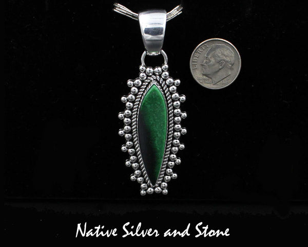 Z Artie Yellowhorse - Navajo<br>1-7/8" Pendant<br>Green Garnet<br>Vertical Sharp Oval<br>Single Twist &<br>Burst Beads/Scatterdot<br>Sterling Silver