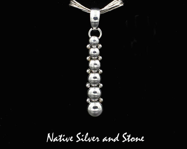 Z Artie Yellowhorse - Navajo<br>1-3/8" Pendant<br>6 Graduated Beads/Dots<br>Sterling Silver