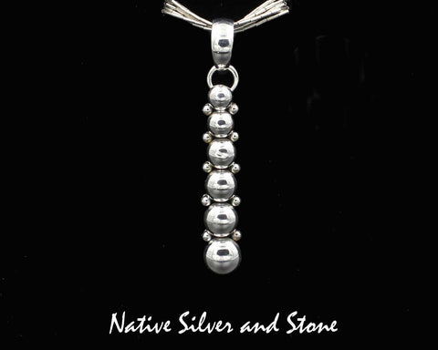 Z Artie Yellowhorse - Navajo<br>1-3/8" Pendant<br>6 Graduated Beads/Dots<br>Sterling Silver
