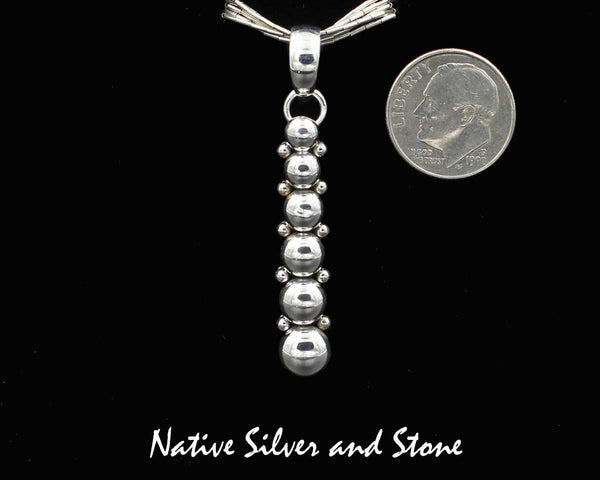 Z Artie Yellowhorse - Navajo<br>1-3/8" Pendant<br>6 Graduated Beads/Dots<br>Sterling Silver