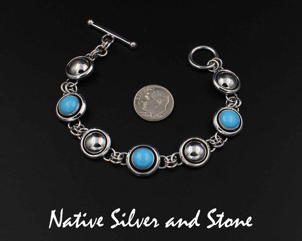Z Artie Yellowhorse - Navajo<br>9/16" Rounds Bracelet - Link<br>9mm Sleeping Beauty Turquoise<br>10mm Silver Rounds<br>Alternating<br>Shadowbox<br>Sterling Silver  Size: 6-1/2 +/-