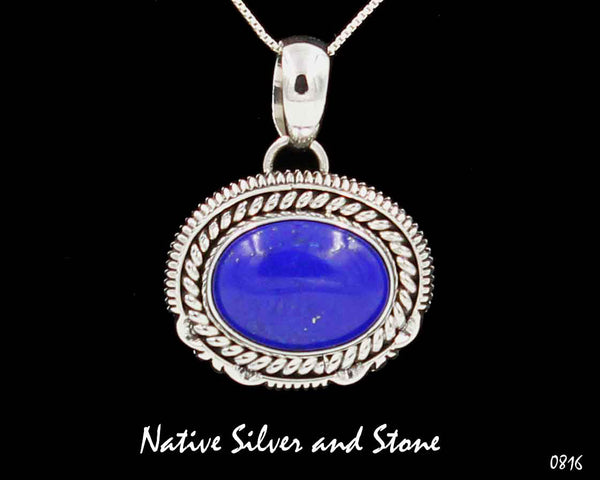 Artie Yellowhorse - Navajo<br>PDLTSSC<br>3/4" Pendant (only) <br>11mm x 16mm Lapis Lazuli Oval<br>Twist & Sawcut with Pinches<br>Sterling Silver