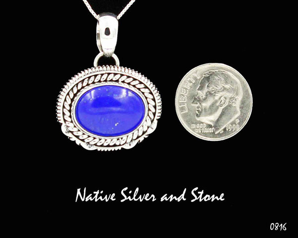 Artie Yellowhorse - Navajo<br>PDLTSSC<br>3/4" Pendant (only) <br>11mm x 16mm Lapis Lazuli Oval<br>Twist & Sawcut with Pinches<br>Sterling Silver