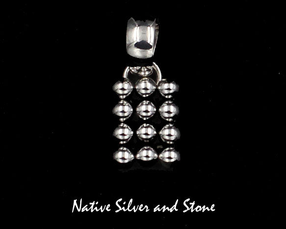 Z Artie Yellowhorse - Navajo<br>1/2" Pendant<br>Vertical Rectangle<br>12 Small Beads<br>4 Rows of 3<br>Sterling Silver