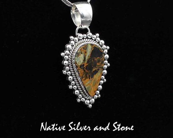 Z Artie Yellowhorse - Navajo<br>PPTBB<br>1-3/4"  Pendant<br>Single Twist & Burst Bead/Scatterdot<br>Small Medium Vertical<br>Reverse Teardrop<br>30mm x 17mm Pietersite/Pietercite<br>Brown-Gold-Olive Dominant<br>Sterling Silver