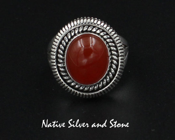 Z Artie Yellowhorse - Navajo<br>3/4" Ring - Small Oval<br>12mm x 10mm Carnelian<br>Twist Wire & Sawcuts<br>Sterling Silver<br>Size 7