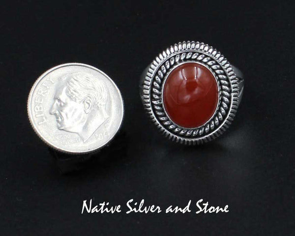 Z Artie Yellowhorse - Navajo<br>3/4" Ring - Small Oval<br>12mm x 10mm Carnelian<br>Twist Wire & Sawcuts<br>Sterling Silver<br>Size 7