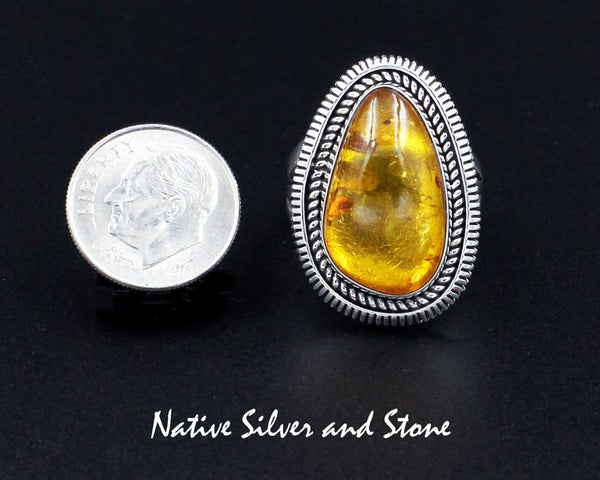 Z Artie Yellowhorse - Navajo<br>1-1/8" Ring - Soft Triangle<br>21mm x 12mm Amber<br>Twist Wire & Sawcut<br> Sterling Silver<br>Size 8