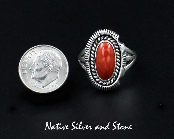 Z Artie Yellowhorse - Navajo<br>7/8" Ring<br>Small Oval<br>13mm Oxblood Coral<br>Single Twist & Sawcut with Pinch<br>Size 8