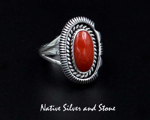 Z Artie Yellowhorse - Navajo<br>7/8" Ring<br>Small Oval<br>13mm Oxblood Coral<br>Single Twist & Sawcut with Pinch<br>Size 8