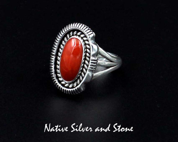 Z Artie Yellowhorse - Navajo<br>7/8" Ring<br>Small Oval<br>13mm Oxblood Coral<br>Single Twist & Sawcut with Pinch<br>Size 8