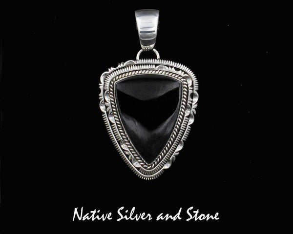 Artie Yellowhorse - Navajo<br>PDOXTDSCP<br>1-3/4" Pendant <br>Onyx Soft Triangle<br>Single Twist & Double Sawcut w Pinches<br>Sterling Silver Perimeter