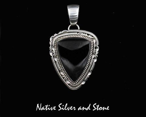 Artie Yellowhorse - Navajo<br>PDOXTDSCP<br>1-3/4" Pendant <br>Onyx Soft Triangle<br>Single Twist & Double Sawcut w Pinches<br>Sterling Silver Perimeter