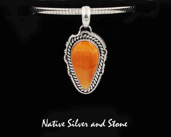 Artie Yellowhorse - Navajo<br>PDOSTSCP<br>1-1/4" Pendant (only)<br>24mm x 13mm Orange Spiny<br>Reverse Teardrop<br>Single Twist & Sawcut w Pinches<br>Sterling Silver