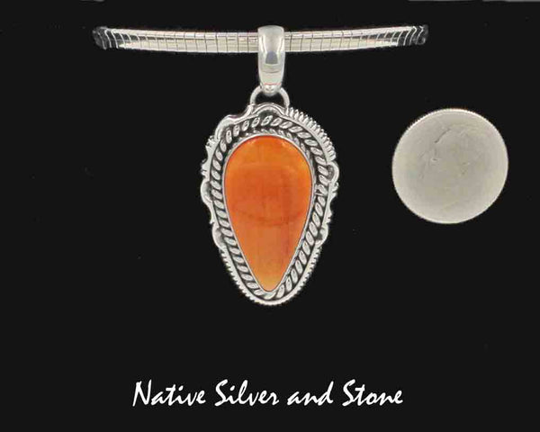 Artie Yellowhorse - Navajo<br>PDOSTSCP<br>1-1/4" Pendant (only)<br>24mm x 13mm Orange Spiny<br>Reverse Teardrop<br>Single Twist & Sawcut w Pinches<br>Sterling Silver