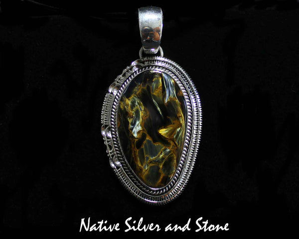 Z Artie Yellowhorse - Navajo<br>2-1/8" Pendant<br>Pietersite/Pietercite - Brown/Gold<br> Large Vertical Freeform<br>Single Twist & Double Sawcut<br>Sterling Silver
