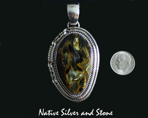 Z Artie Yellowhorse - Navajo<br>2-1/8" Pendant<br>Pietersite/Pietercite - Brown/Gold<br> Large Vertical Freeform<br>Single Twist & Double Sawcut<br>Sterling Silver