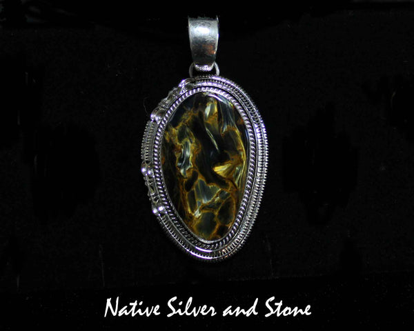 Z Artie Yellowhorse - Navajo<br>2-1/8" Pendant<br>Pietersite/Pietercite - Brown/Gold<br> Large Vertical Freeform<br>Single Twist & Double Sawcut<br>Sterling Silver