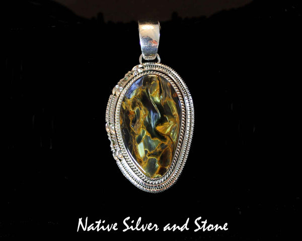 Z Artie Yellowhorse - Navajo<br>2-1/8" Pendant<br>Pietersite/Pietercite - Brown/Gold<br> Large Vertical Freeform<br>Single Twist & Double Sawcut<br>Sterling Silver