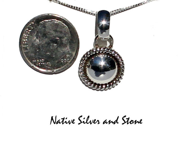 Z Artie Yellowhorse - Navajo Jewelry<br>Pendant of 5/8" Small Domes with Single Twist<br>Sterling Silver<br>with 18" Silver Box Chain
