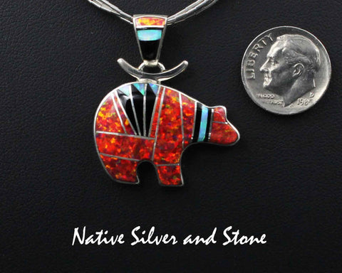 Z Cathy Webster - Navajo<br>13/16" Pendant Multi-Inlay Bear <br>Imitation Red Fire Opal<br>Onyx, Turquoise<br>Sterling Silver