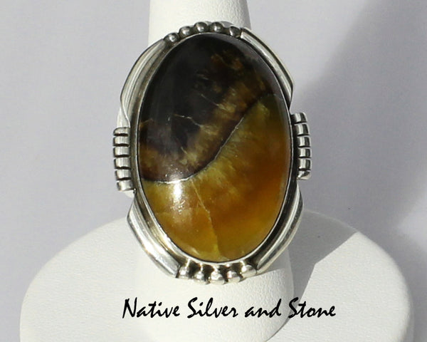 E.A. Miscellaneous Artist<br>Navajo Jewelry<br>Medium Large Oval - Simbercite<br>Saw Cut & Beaded Sterling Silver Accents - Size 8