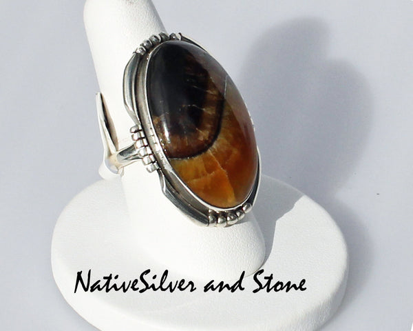 E.A. Miscellaneous Artist<br>Navajo Jewelry<br>Medium Large Oval - Simbercite<br>Saw Cut & Beaded Sterling Silver Accents - Size 8