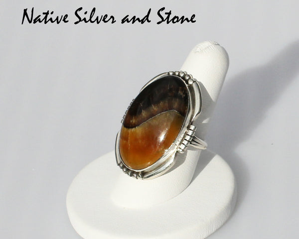 E.A. Miscellaneous Artist<br>Navajo Jewelry<br>Medium Large Oval - Simbercite<br>Saw Cut & Beaded Sterling Silver Accents - Size 8