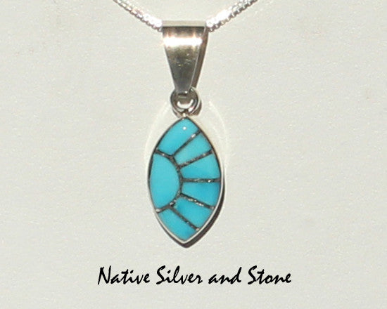 Z Eldrick & Charlotte Seoutewa<br> Zuni Jewelry<br>Pendant (Only)<br>Turquoise<br>Sharp Oval Multi-Inlays<br>Silver Sun Ray Accent