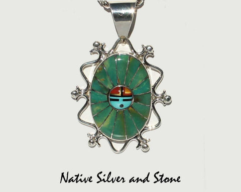 Eldrick & Charlotte Seoutewa<br> Zuni Jewelry<br>Pendant (Only)<br>Oval Multi-Inlays<br>Green Kingman Turquoise, Jet, Coral<br>Mother of Pearl, Blue Turquoise<br>Silver Filagree & Dot Accents