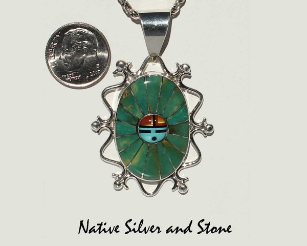 Eldrick & Charlotte Seoutewa<br> Zuni Jewelry<br>Pendant (Only)<br>Oval Multi-Inlays<br>Green Kingman Turquoise, Jet, Coral<br>Mother of Pearl, Blue Turquoise<br>Silver Filagree & Dot Accents